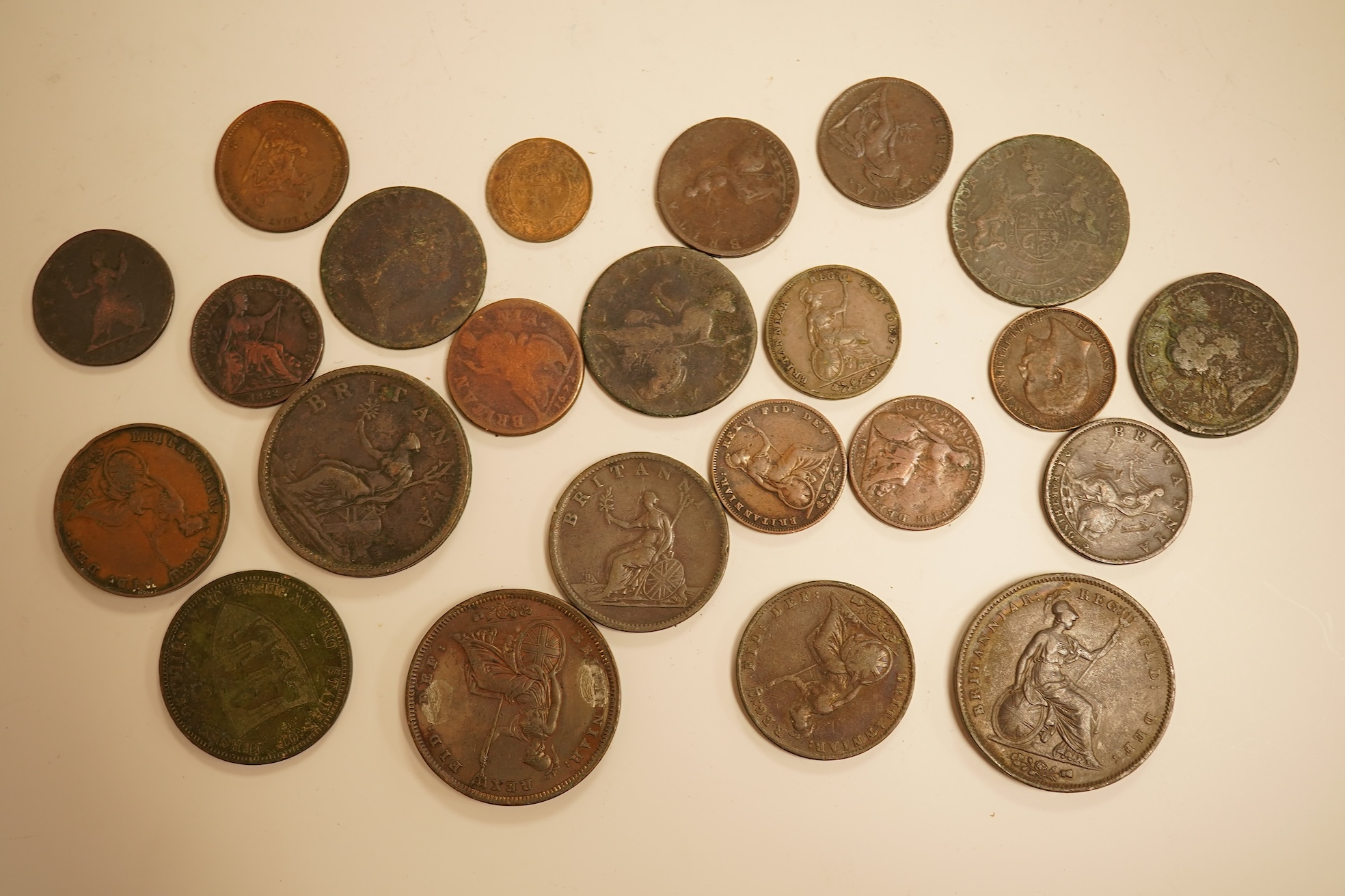 Twenty three copper coins including a William IV penny